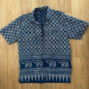 Indigo patterned button down mens polo tee.